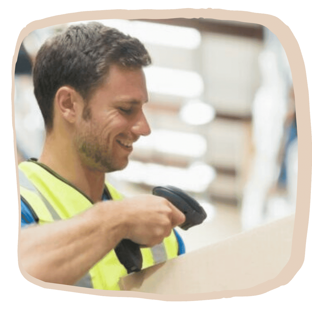 This is an image of a worker scanning a box.